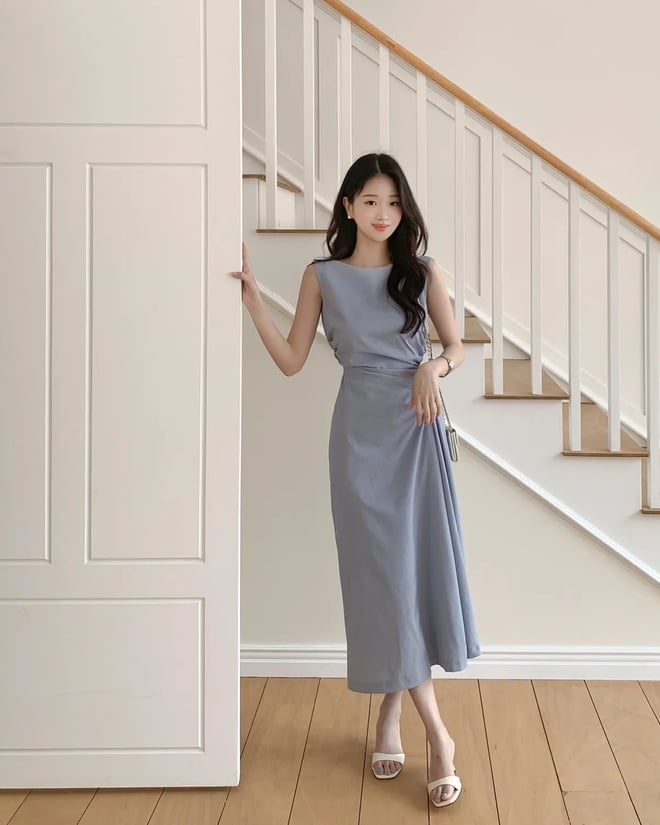 Không thể bỏ qua trong danh sách váy liền tôn dáng chính là váy nhấn eo.